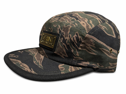 Camouflage-patterned cap with a brand logo on a white background