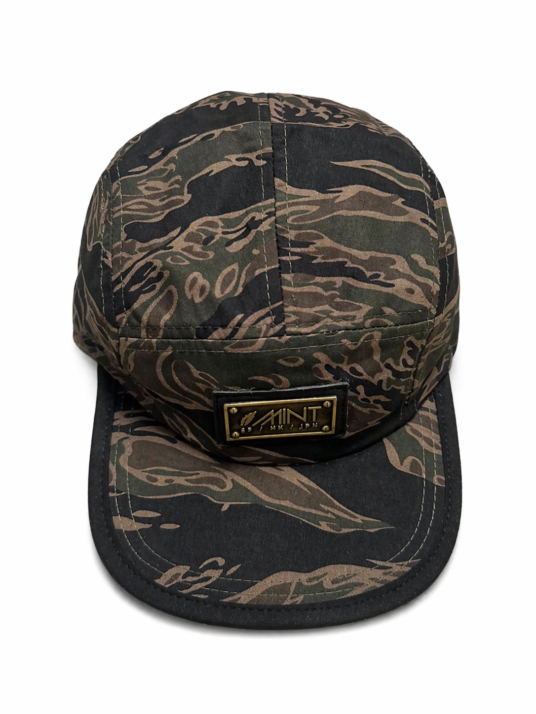 Camouflage-patterned cap with a brand logo on a white background
