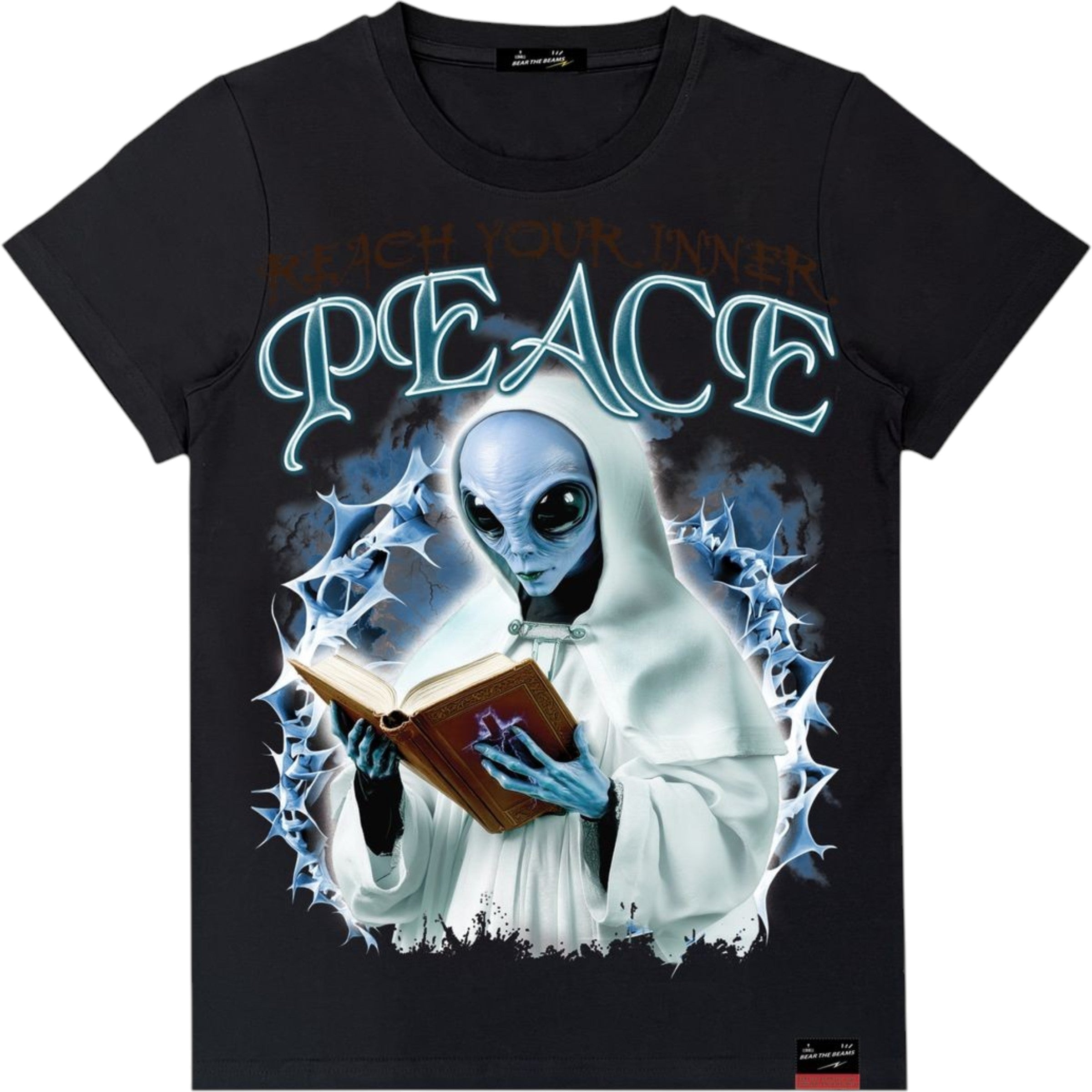 Black t-shirt with alien holding a book and 'Reach Your Inner Peace' text on a white background