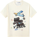 Beige t-shirt with a teddy bear and airplane graphic and 'VIBES' text on a white background.