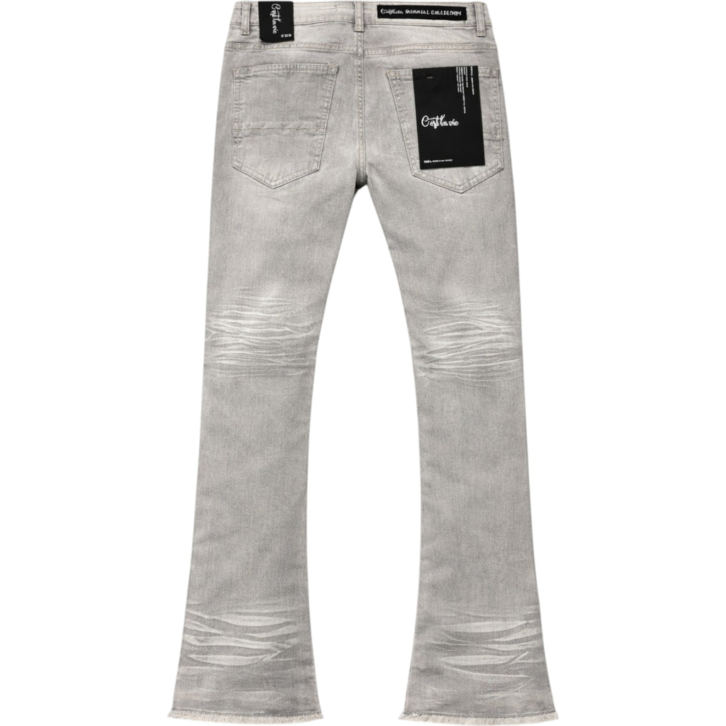 Gray jeans with brand labels on a white background