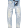 Distressed light blue jeans on a white background
