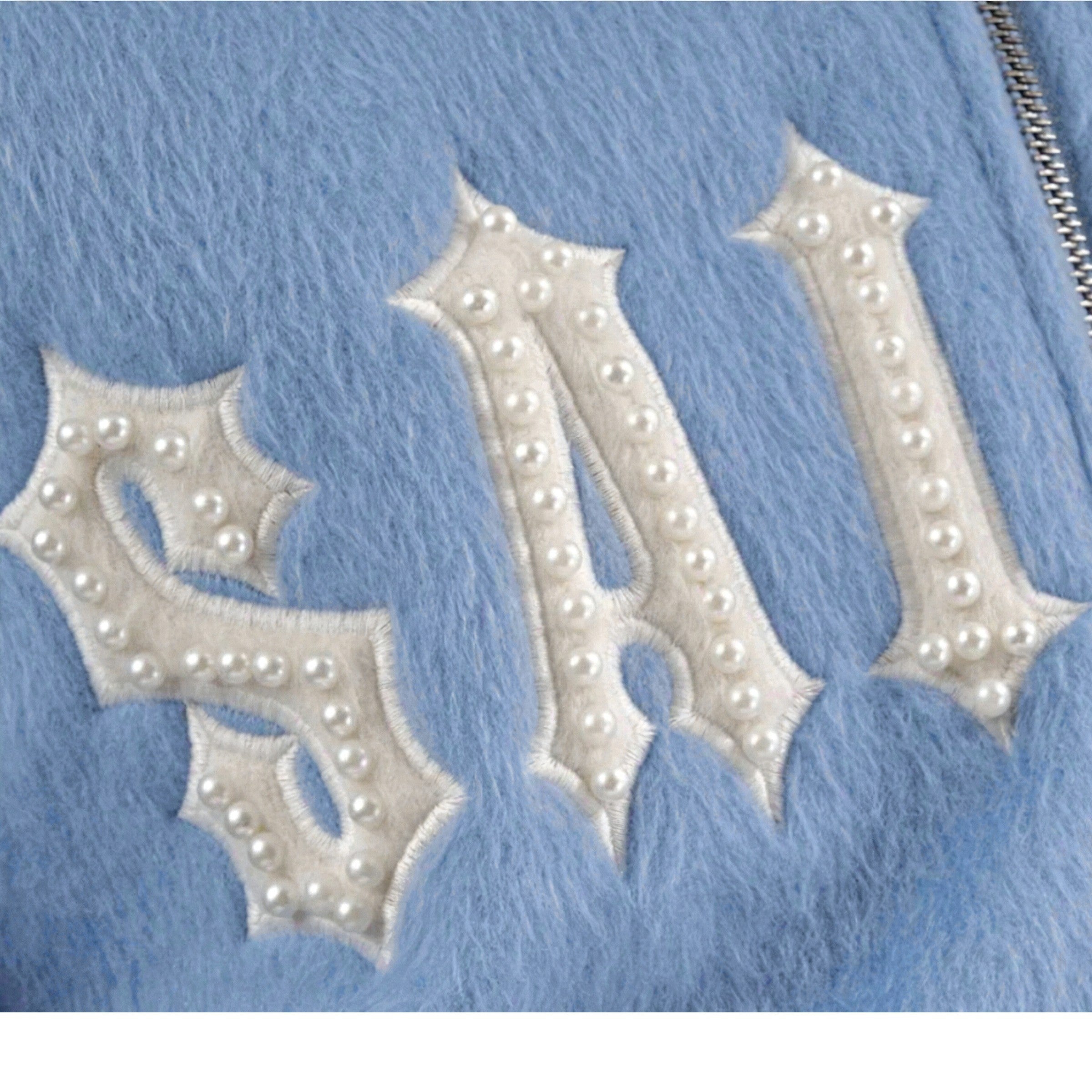 Close-up of a blue fabric with 'SA' initials embroidered in white thread.Copper Rivet 'Saints' Mohair Pearl Embroidery Zip Hoodie (Light Blue) 531081