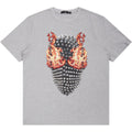 Gray t-shirt with a unique design featuring flames and spikes on a white background