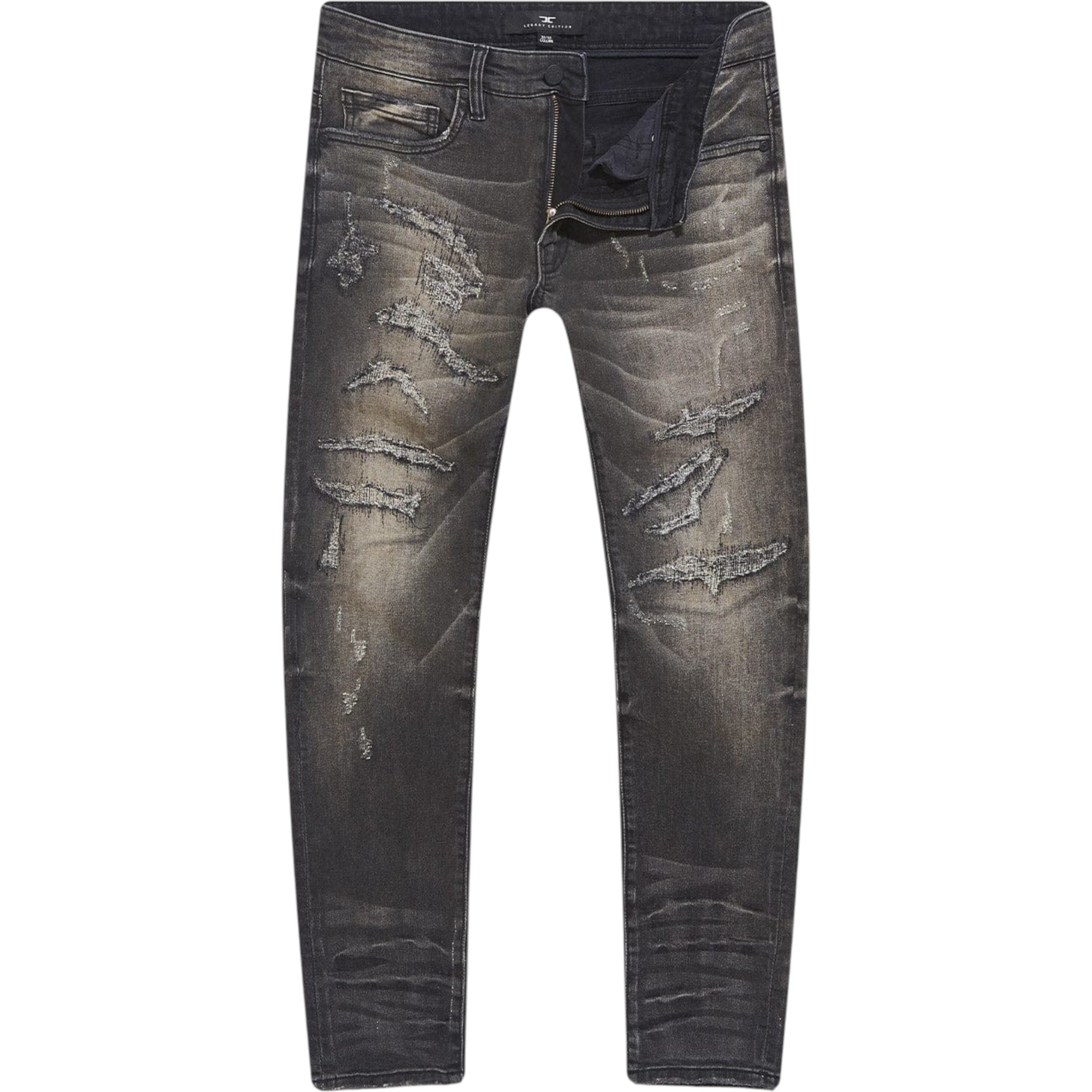 Distressed black jeans on a white background