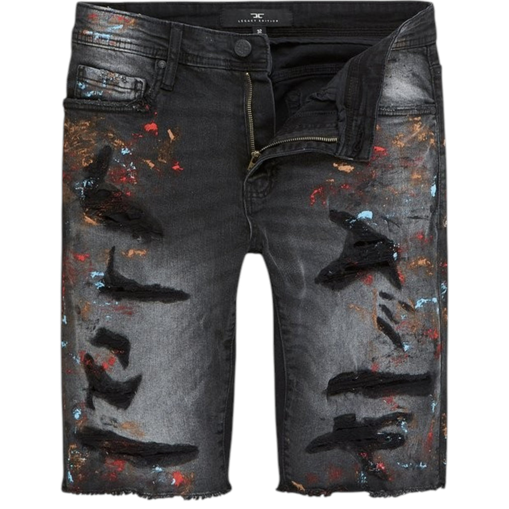 Black distressed denim shorts with colorful paint splashes on a white background