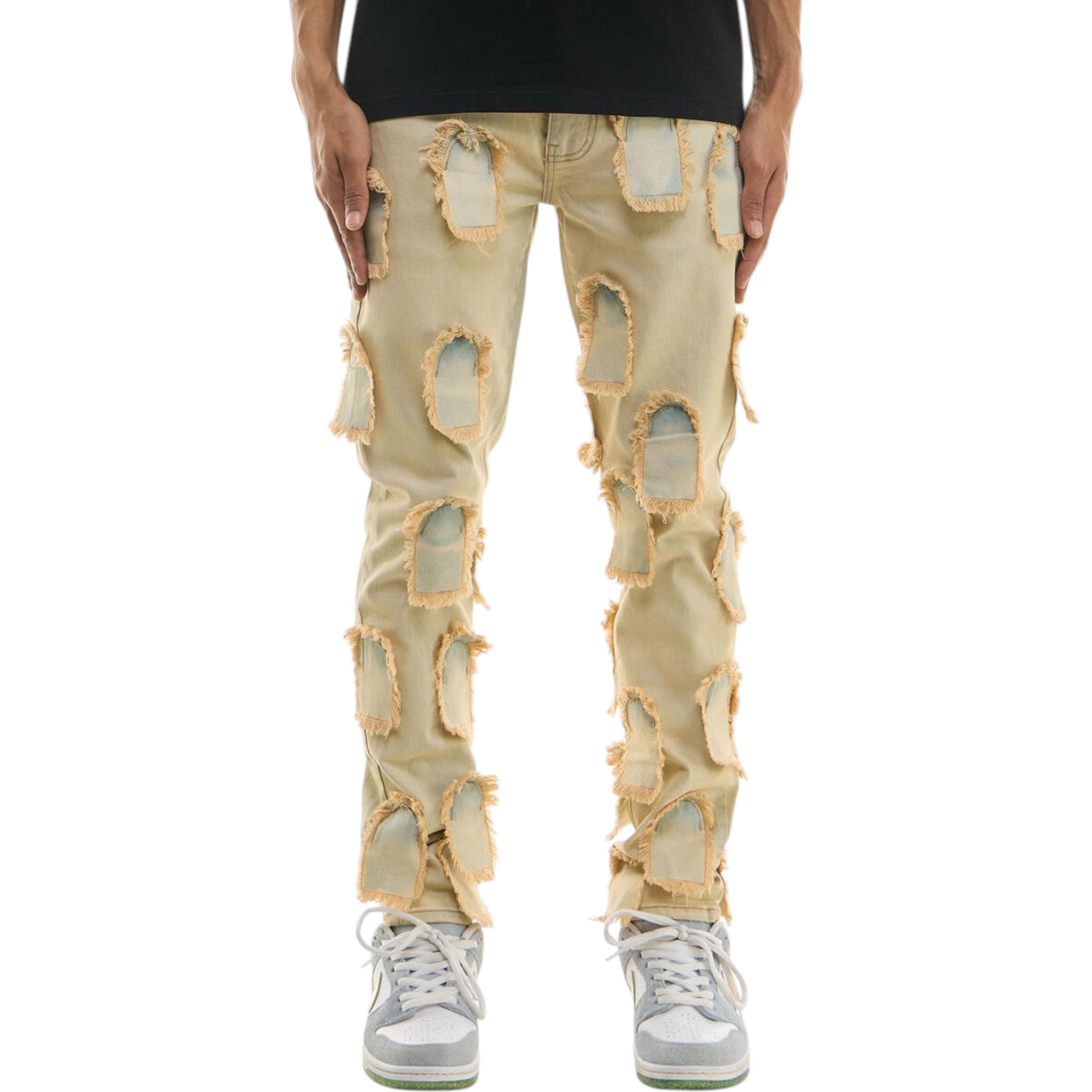 Beige distressed jeans worn by a person on a white background KDNK 'Flying Patched' Skinny Denim (Blue) KND4697
