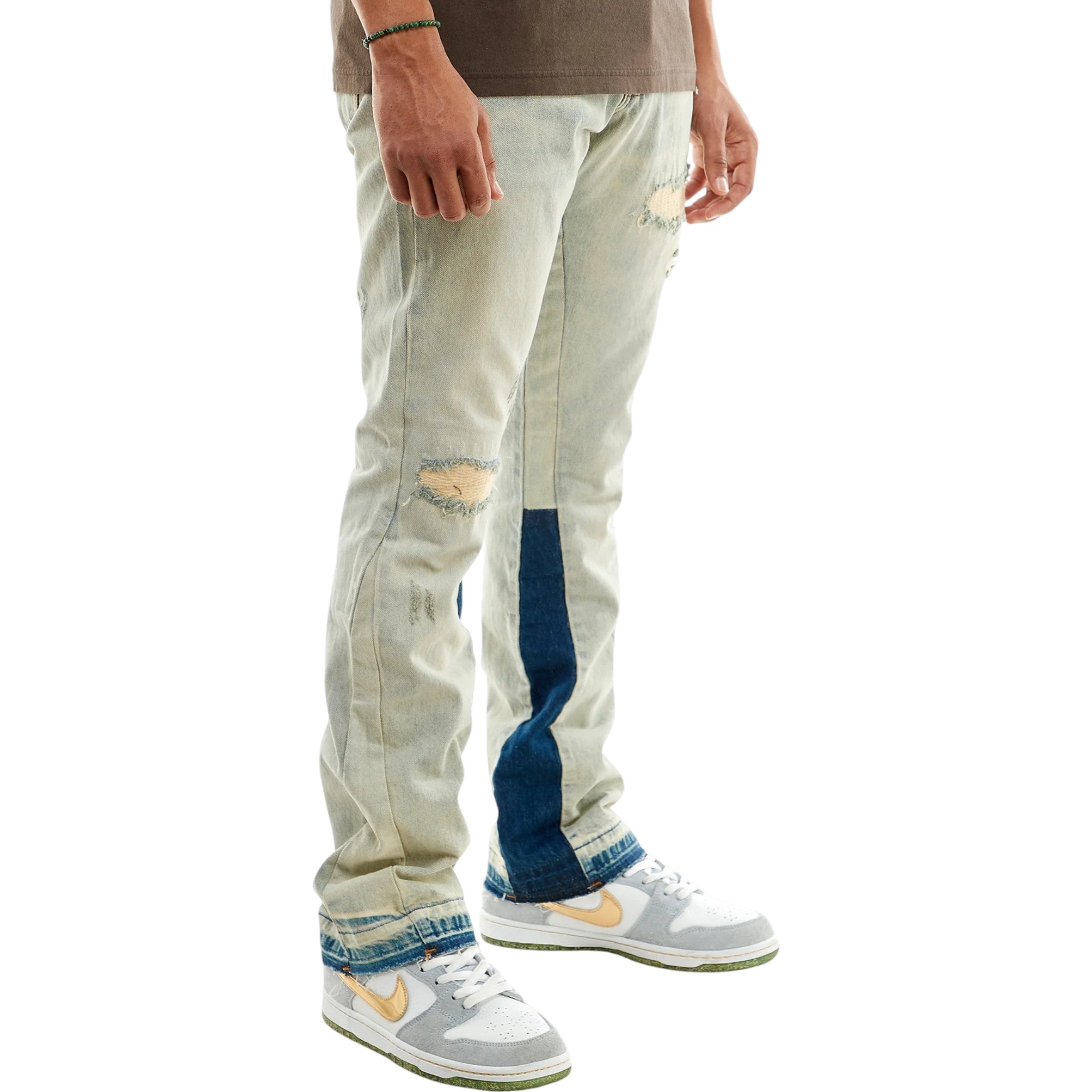 Light blue jeans with patchwork design worn by a person on a white background KDNK Rip Repaired Flare Denim KND4512 (T.Blue)