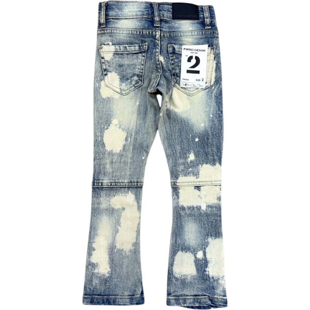 Distressed blue jeans with a brand tag on a white background