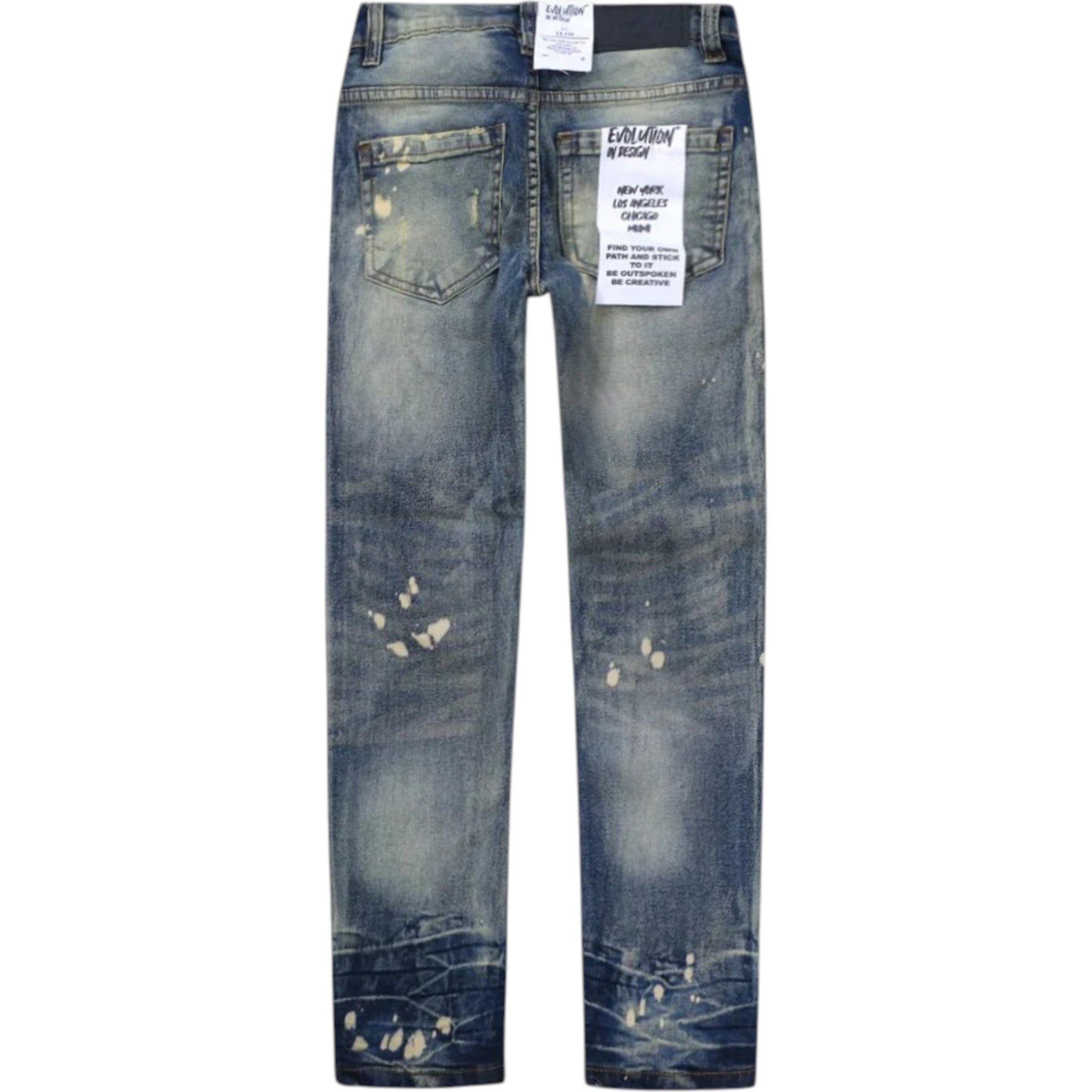 Distressed blue jeans with a tag on a white background
