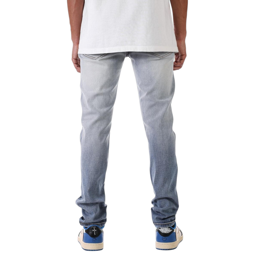 Slim Fit Ripped Distressed Denim In Faded Blue