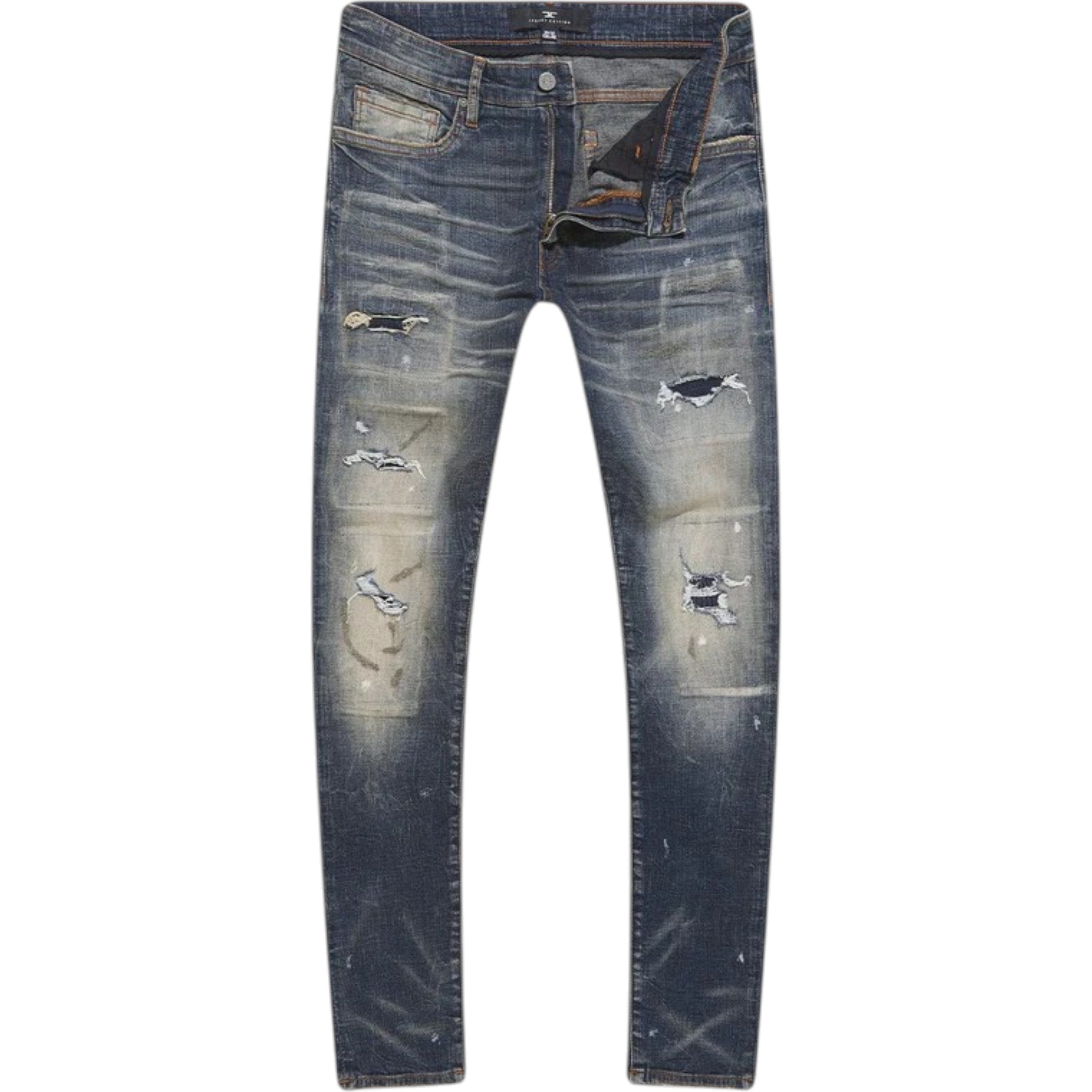 Distressed blue jeans on a white background