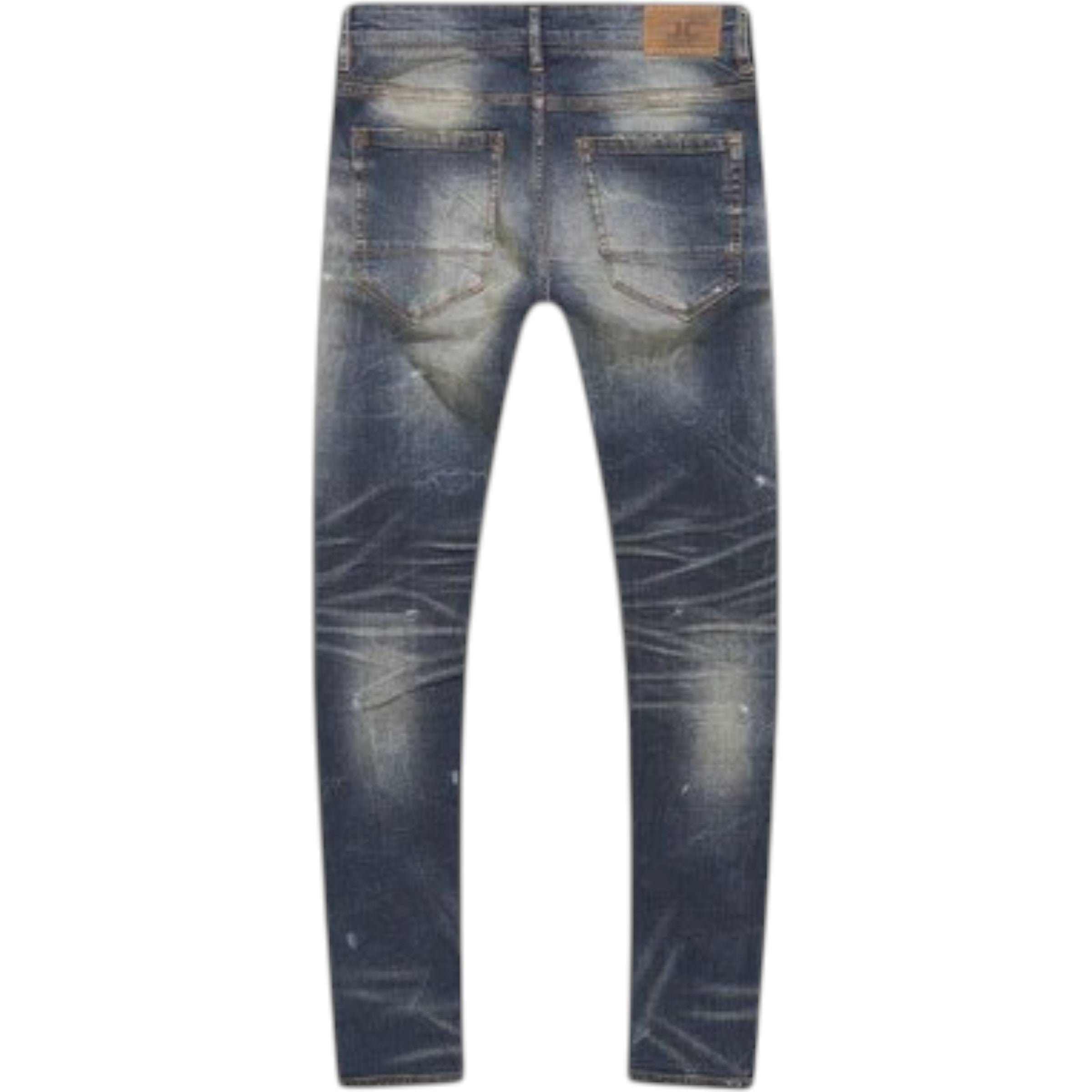 Back view of a pair of distressed blue jeans on a white background