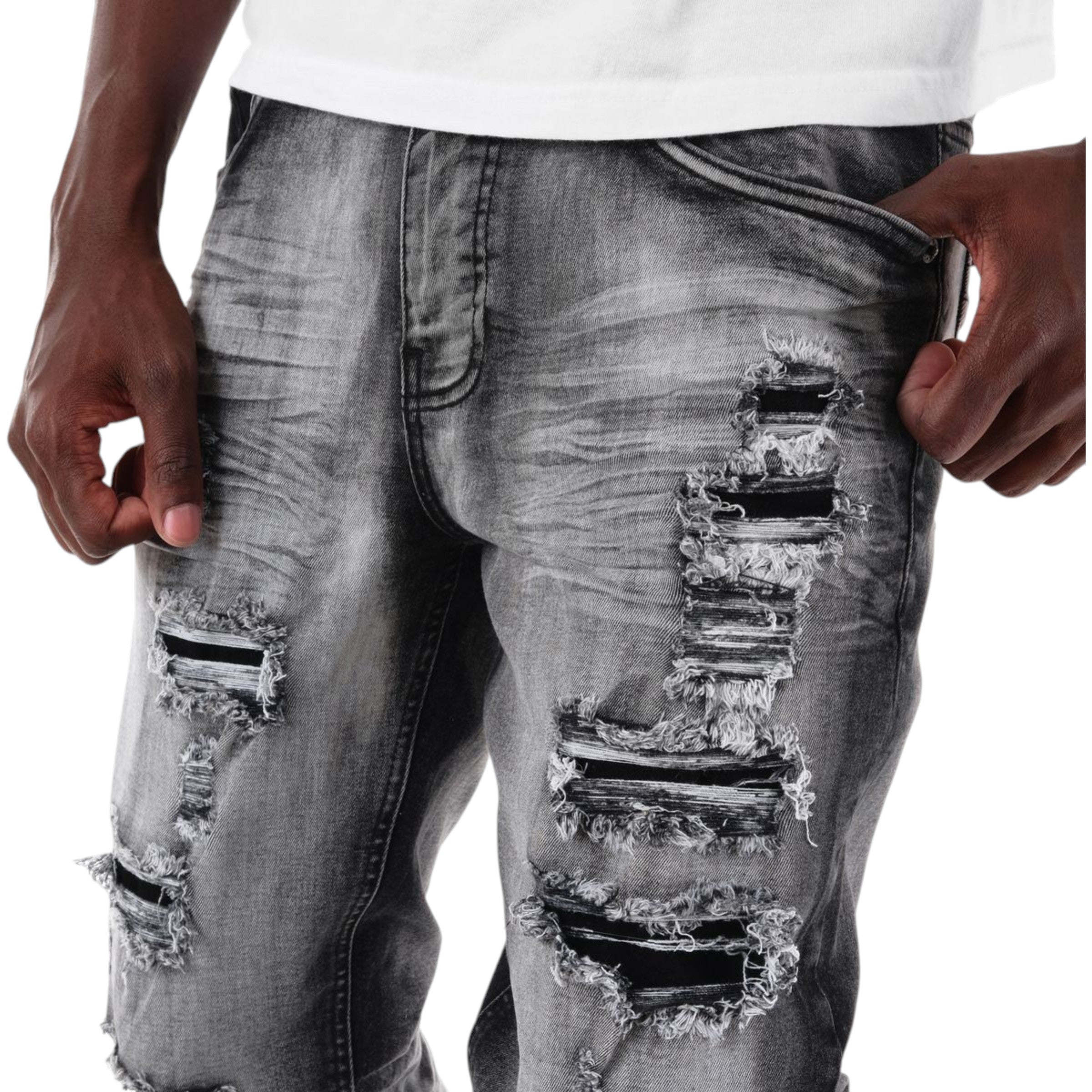 Ripped jeans with a white background