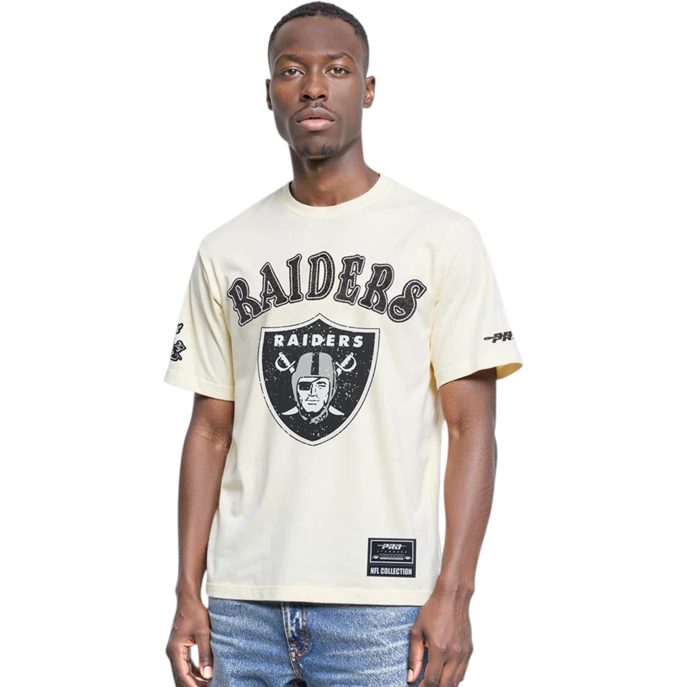 Man wearing a white 'Raiders' t-shirt with a logo on a white background