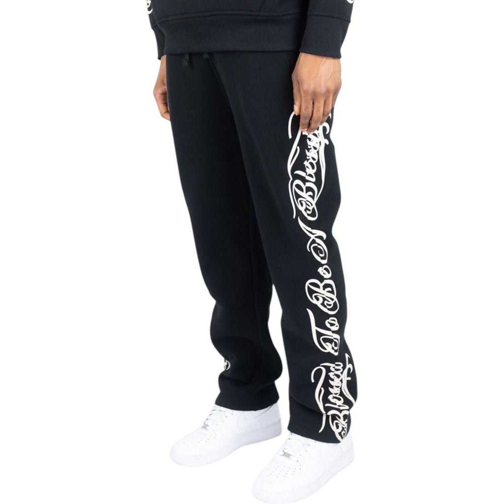 Black jogger pants with white text design on a white background