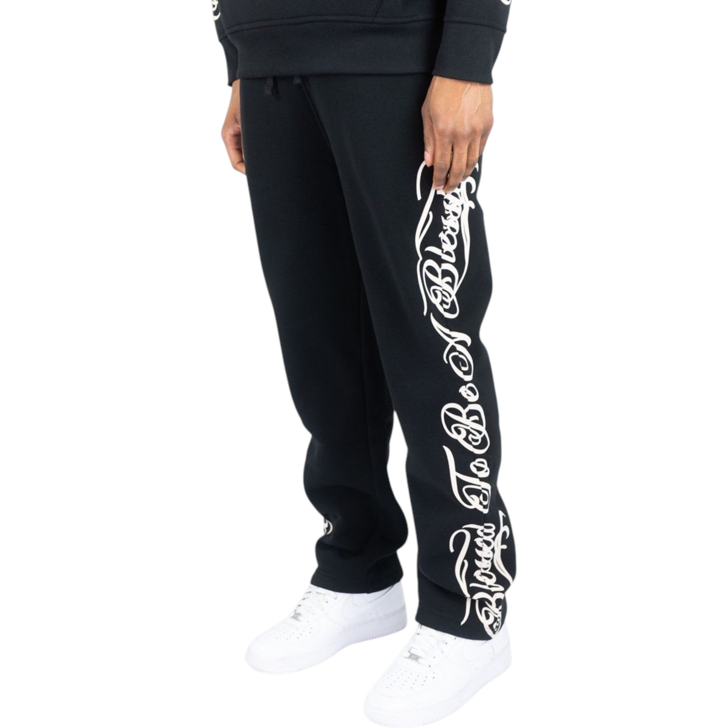 Black jogger pants with white text design on a white background