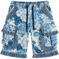 Blue floral shorts with fringe details on a white background