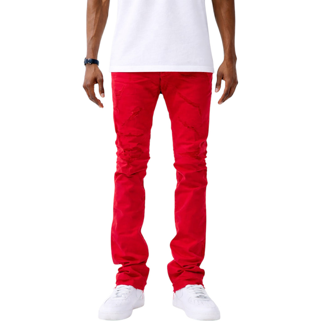 Red pants worn by a person on a white background