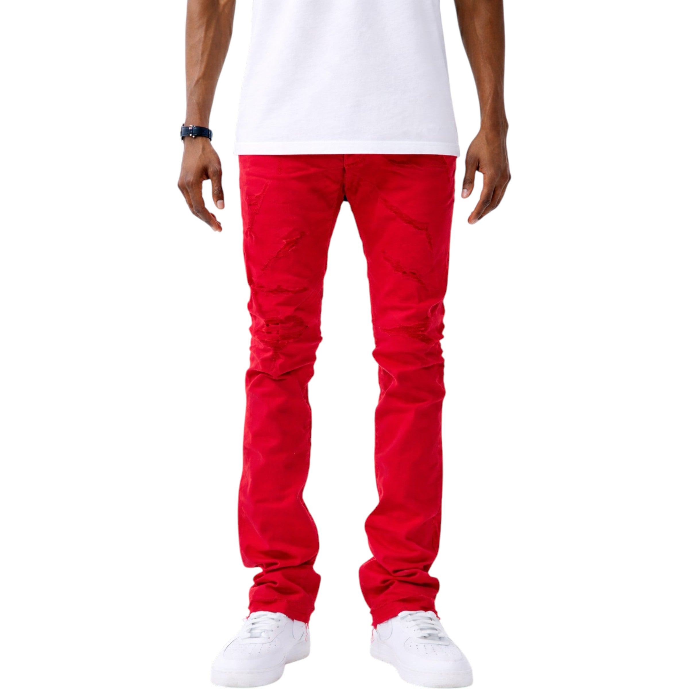 Red pants worn by a person on a white background