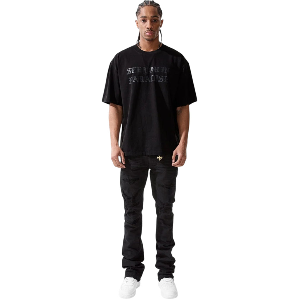 Person wearing a black t-shirt and pants on a white background SYIP 'York' Stacked Denim (Jet Black) JTF2117