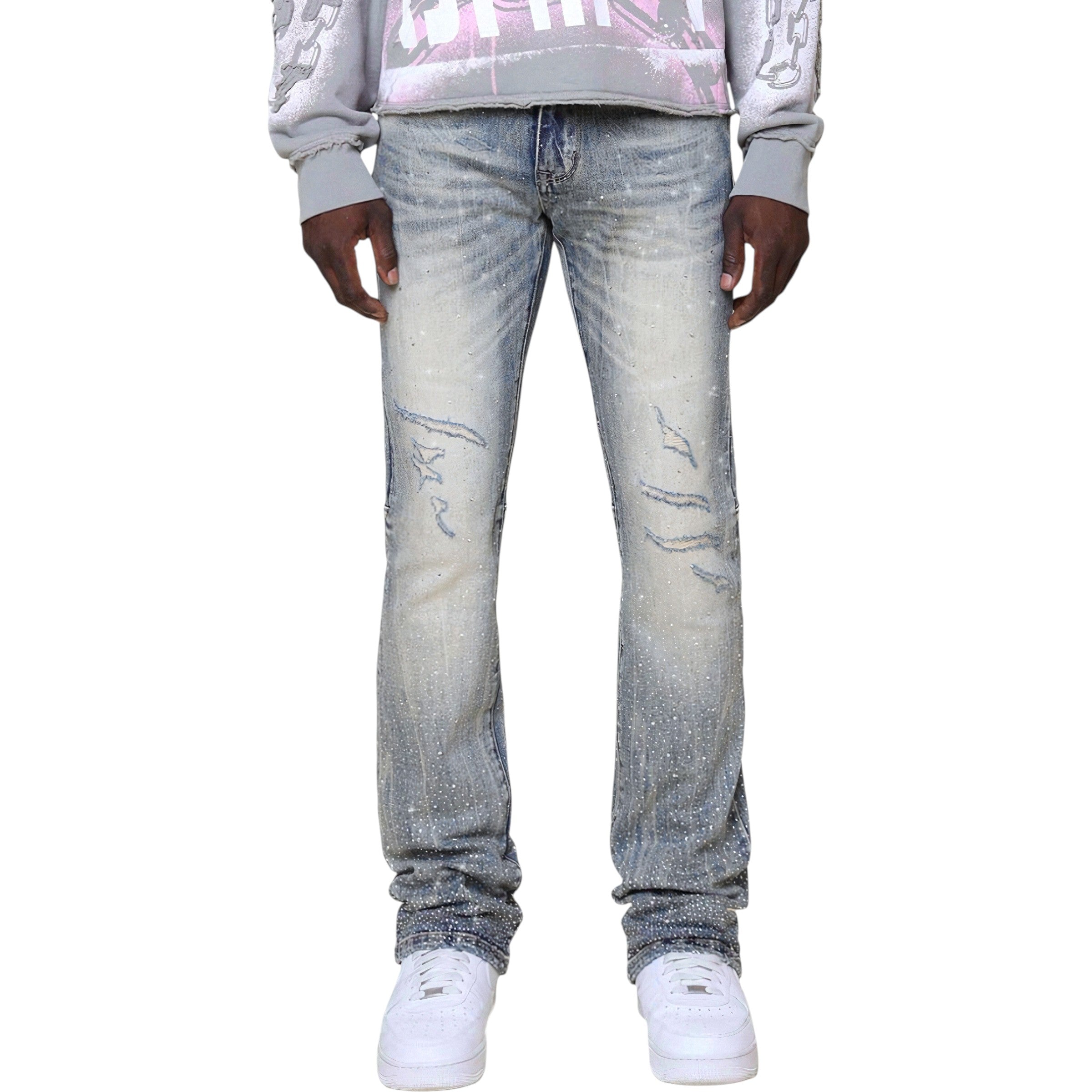 Person wearing light blue jeans and a gray sweatshirt on a white Smoke Rise 'All Rhinestone' Stacked Flare Denim (Mojave Blue) JP25536background