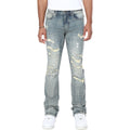 Distressed light blue jeans worn by a person on a white background