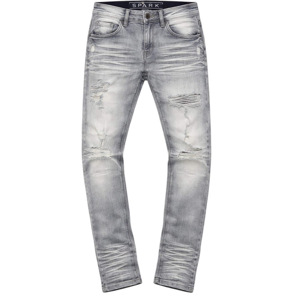 Ripped gray jeans with 'Spark' branding on a white background