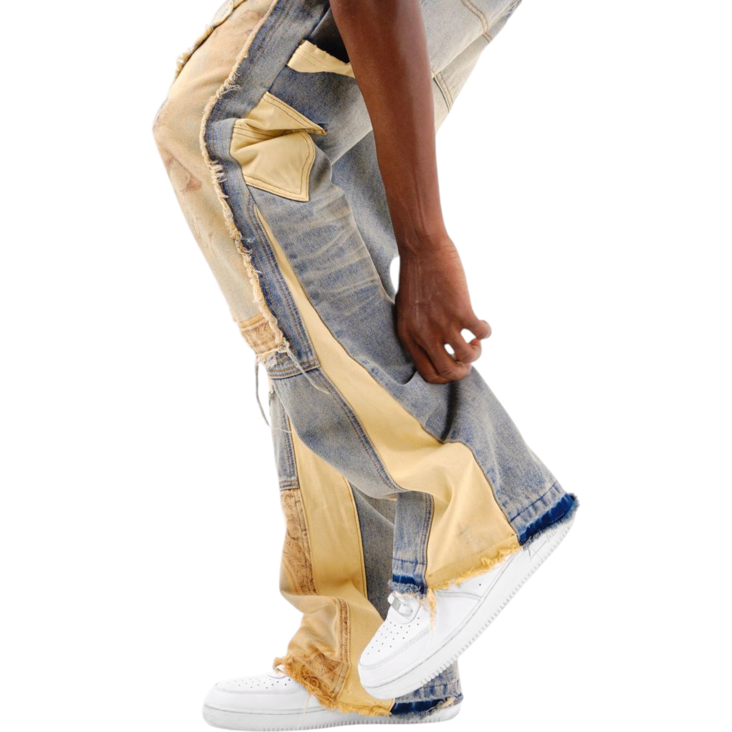 Patchwork jeans with a white sneaker on a white background