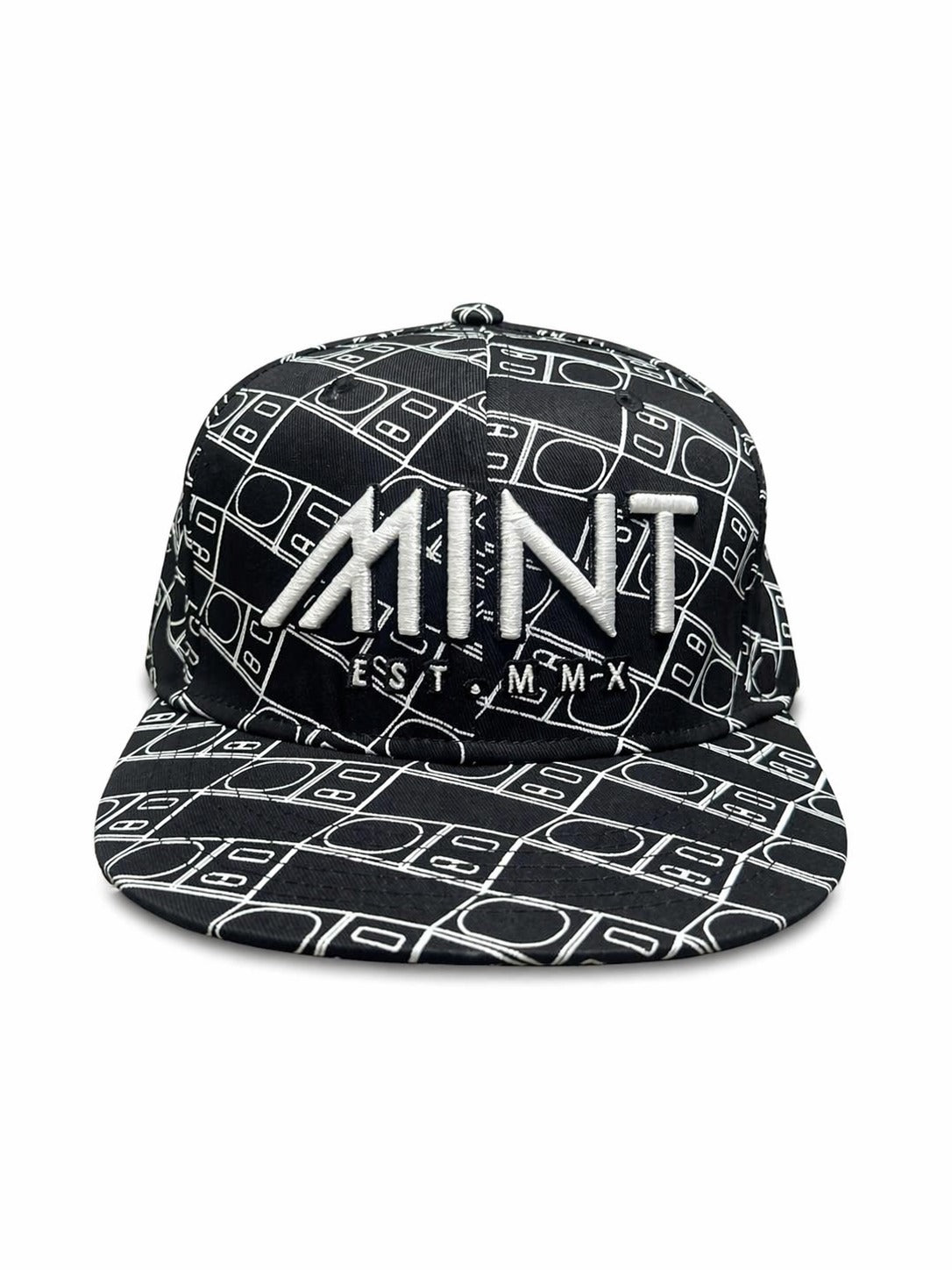 Black cap with white geometric pattern and 'MINT' branding on a white background