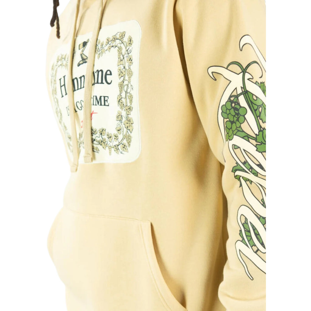 Beige hoodie with graphic designs on sleeves