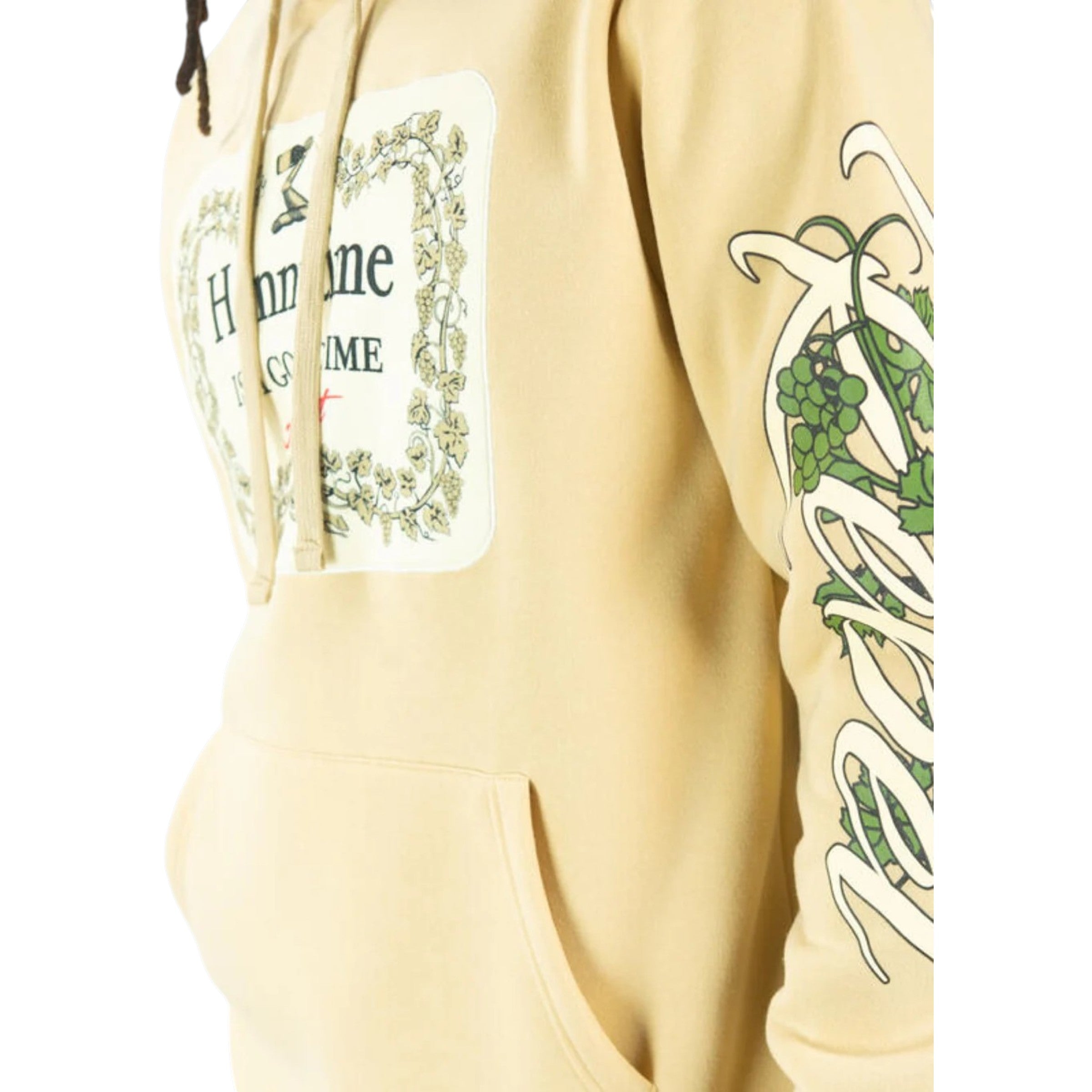 Beige hoodie with graphic designs on sleeves