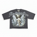Gray t-shirt with angel graphic and 'Redemption' text on a white background