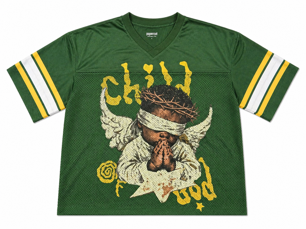 Green sports jersey with graphic design of a child with wings and text on a white background